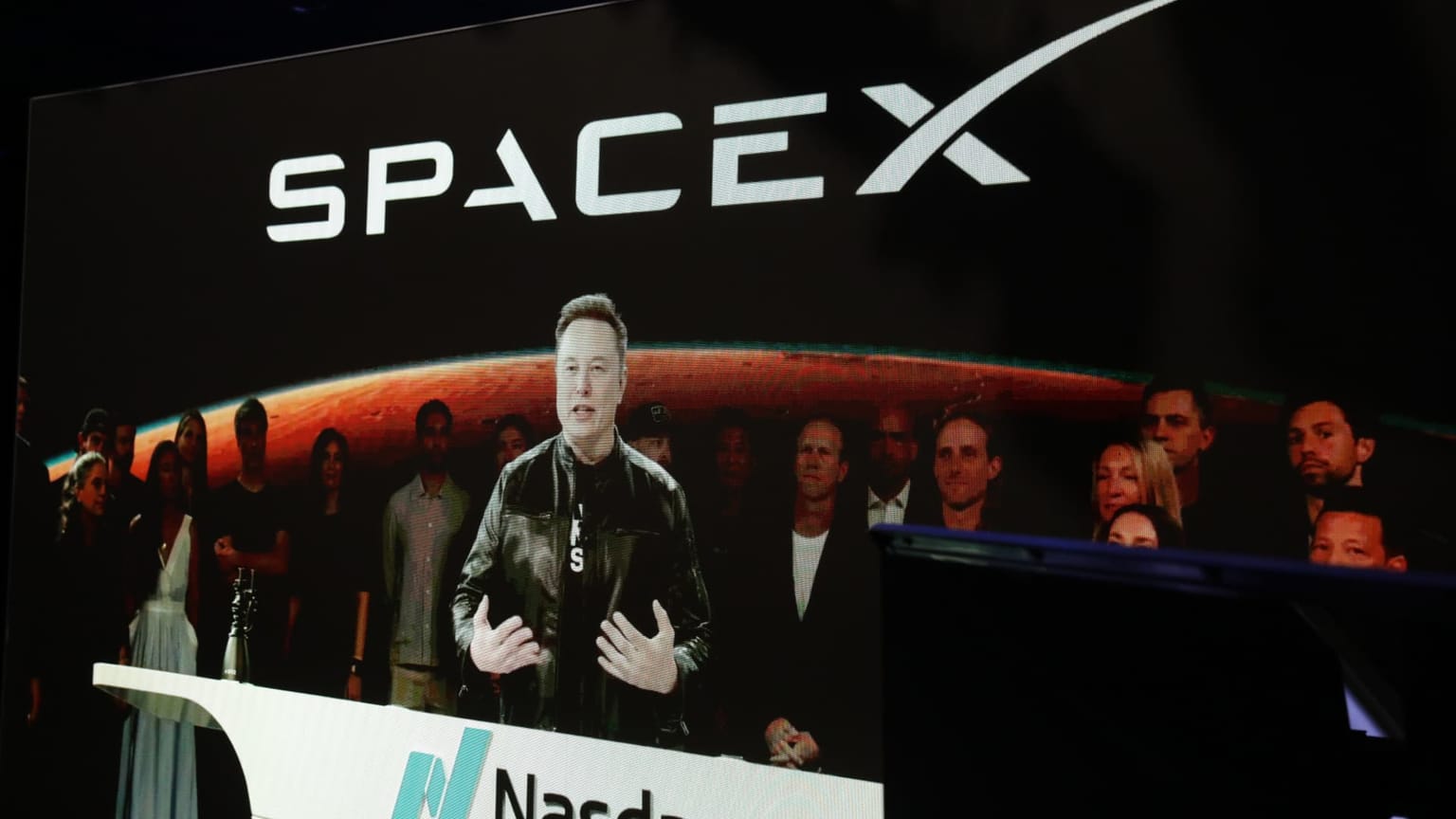 A SpaceX rocket and launch imagery marking the company's first-ever quarterly earnings report as a public company on Tuesday August 4 2026, when revenue jumped 92 percent from a year earlier to 7.81 billion dollars and Starlink reached 12 million subscribers, yet the newly listed stock slid in after-hours trading as capital expenditure soared more than sixfold to 18.37 billion dollars, including 15.83 billion dollars on artificial intelligence infrastructure