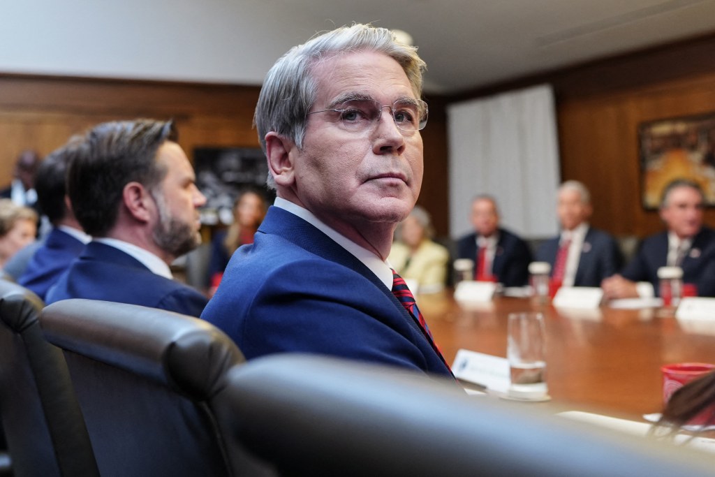 Treasury Secretary Scott Bessent at a Cabinet table on Wednesday August 19 2026, the session the Treasury Department said it would at least double long-end liquidity-support buybacks, the 30-year yield eased toward 5.19 percent from Tuesday's 19-year high, and the S&P 500 closed at 7,707.98 to snap a three-day slide