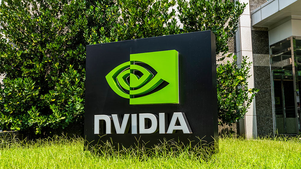 The Nvidia monument sign with the company's green eye logo on a black plinth outside a campus building, used as the ThriveInMarkets evening-review hero for Wednesday August 26 2026, when the chipmaker reported fiscal second-quarter revenue of 96.2 billion dollars and guided the third quarter to 108 billion dollars after the US close, then saw shares slip in after-hours trading following a cash close of 209.66 dollars, down 1.59 percent, as the S&P 500 finished 7,675.70 after July headline PCE held at 3.7 percent