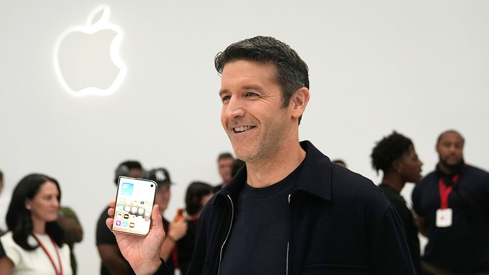 Apple CEO John Ternus holds the new foldable iPhone Duo in front of a glowing Apple logo, used as the ThriveInMarkets evening-review inline image for Wednesday September 9 2026, when Apple closed 315.34 dollars, down 0.28 percent, after Ternus's first launch as CEO unveiled the iPhone Duo and raised iPhone 18 Pro starting prices by 100 dollars to 1,199 dollars