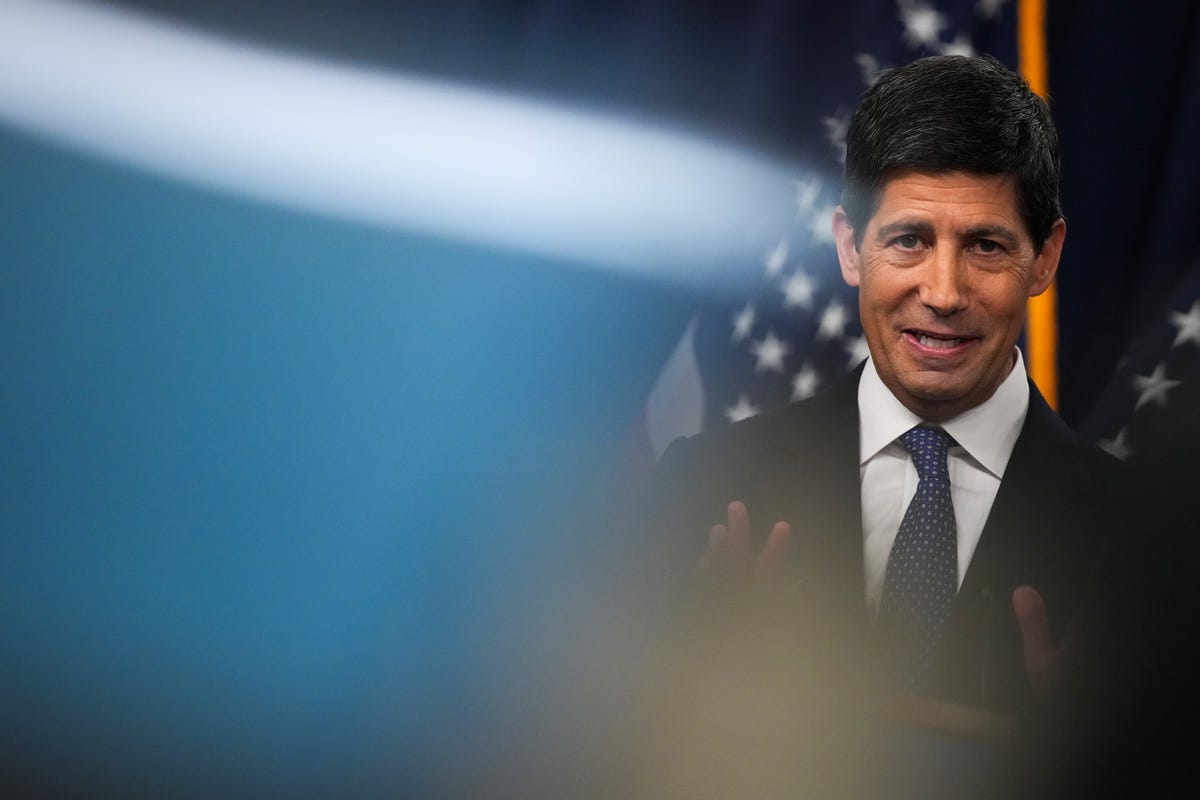 Federal Reserve Chair Kevin Warsh speaks at a press conference in front of US flags after the September 16 2026 FOMC, used as the ThriveInMarkets evening-review inline image when the committee hiked 25 basis points to 3.75 to 4.00 percent and Warsh said inflation remains too high