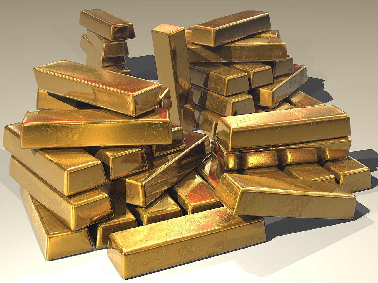 Gold bars stacked representing safe haven demand as Iran deadline looms April 7 2026