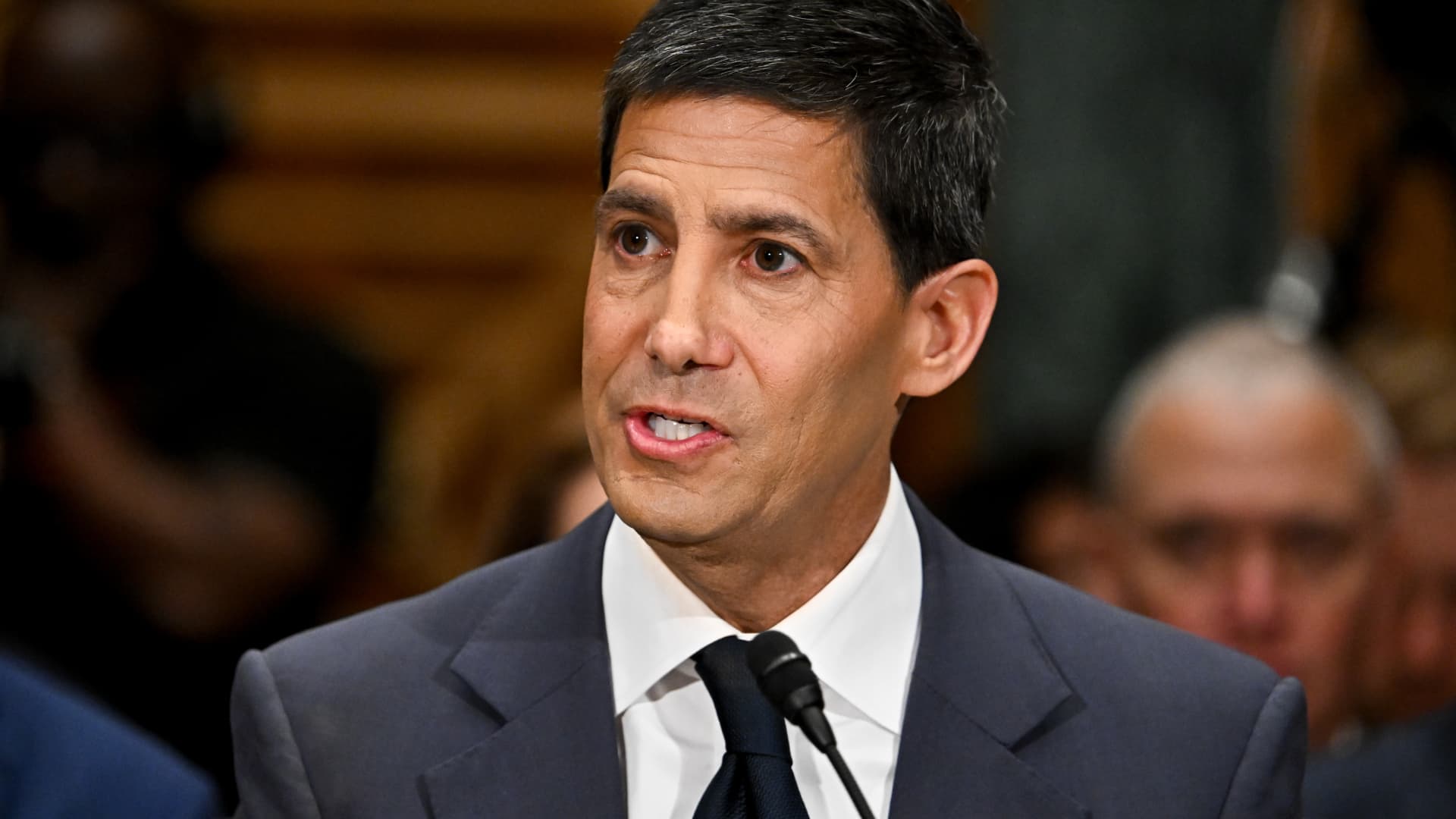 Kevin Warsh Fed Chair nominee at Senate Banking Committee confirmation hearing April 21 2026 where he pledged to be an independent actor and not Trump's sock puppet as Tillis holds committee vote at 12 to 12