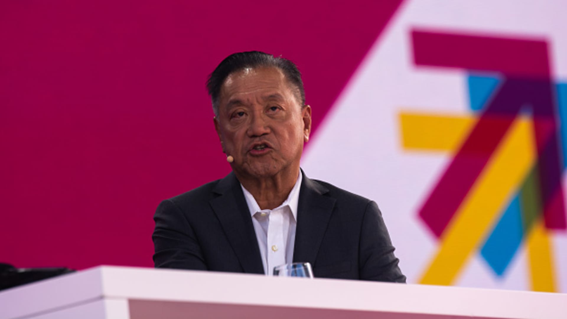 Broadcom chief executive Hock Tan speaking on stage illustrating the June 4 2026 ThriveInMarkets morning analysis as the chipmaker reported record fiscal second-quarter revenue of about 22.19 billion dollars, up roughly 48 percent year over year on surging artificial intelligence semiconductor demand, and guided third-quarter revenue to about 29.4 billion dollars, yet the stock fell after Tan reiterated rather than raised the full-year AI semiconductor revenue outlook above 100 billion dollars, disappointing a market priced for an upgrade and pressuring the broader chip complex
