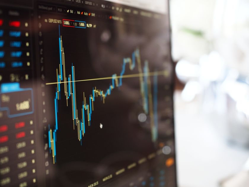 A trading chart with blue and yellow candlesticks and bid and ask prices displayed on a monitor screen, illustrating the June 8 2026 ThriveInMarkets morning analysis as markets braced for the May Consumer Price Index due Wednesday June 10, the final major data point before the June 16 to 17 Federal Reserve meeting, after April inflation accelerated to 3.8 percent year over year, the hottest reading since May 2023, and a hot May jobs report revived bets that the Fed under new Chair Kevin Warsh may have to lean hawkish