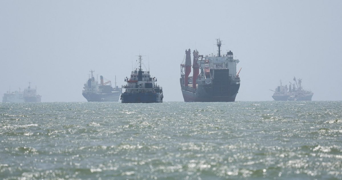 Cargo and support vessels sit on the Strait of Hormuz off Bandar Abbas, Iran, on August 25 2026, used as the ThriveInMarkets morning analysis hero for Wednesday August 26 2026, when West Texas Intermediate slid toward 80 dollars as Iran and Oman discussed a temporary joint maritime corridor, overnight E-mini S&P 500 futures sat near 7,683 after Tuesday's 7,677.28 cash close, and traders waited on July core PCE then Nvidia after the close