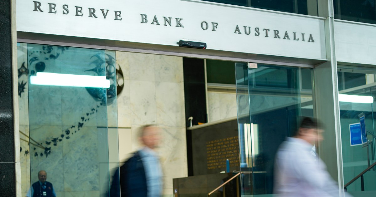 People walk out of the Reserve Bank of Australia building in Sydney, used as the ThriveInMarkets morning analysis hero for Tuesday September 29 2026, when the RBA lifted the cash rate 25 basis points to 4.60 percent, a 15-year high, overnight E-mini S&P 500 December futures sat near 7,736 against Monday's 7,683.69 cash close, and West Texas Intermediate last printed about 94.05 dollars