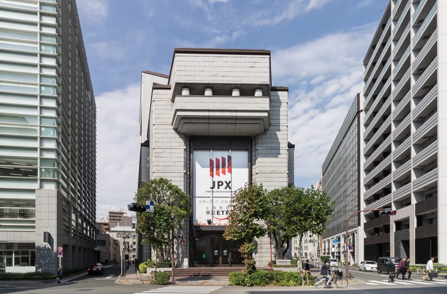 Tokyo Stock Exchange main building with a JPX banner, morning analysis for Oct 23 2026