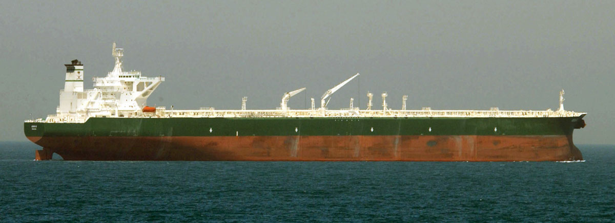 Oil supertanker representing the oil price collapse and macro implications April 8 2026