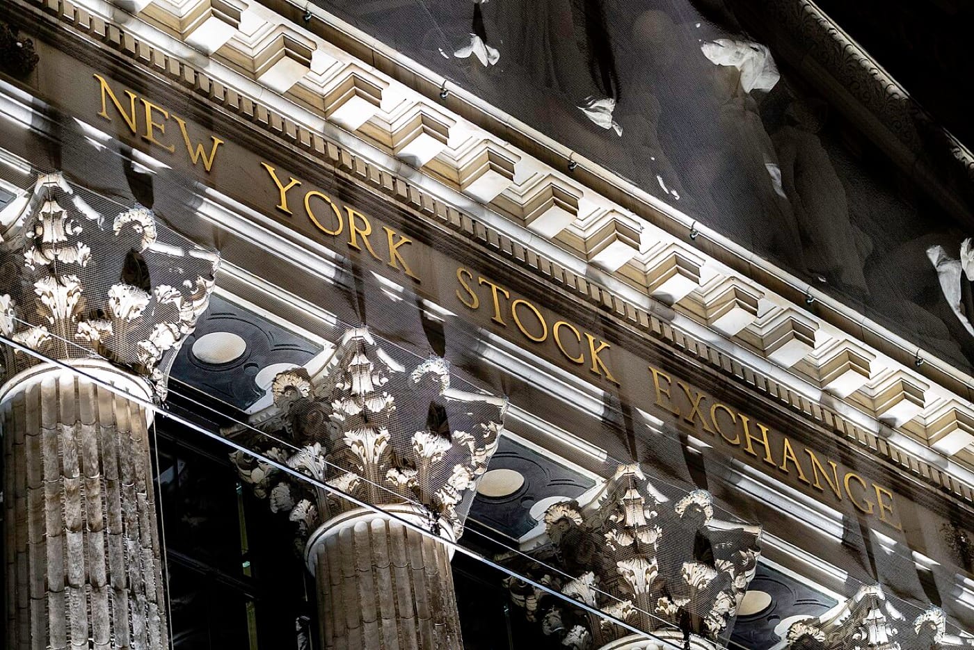 The New York Stock Exchange sign on Broad Street, used as the ThriveInMarkets mid-day pulse hero for Monday October 5 2026, when the S&P 500 last printed about 7,758, up about 0.5 percent, after ISM services came in at 54.9 and the prices index hit 74