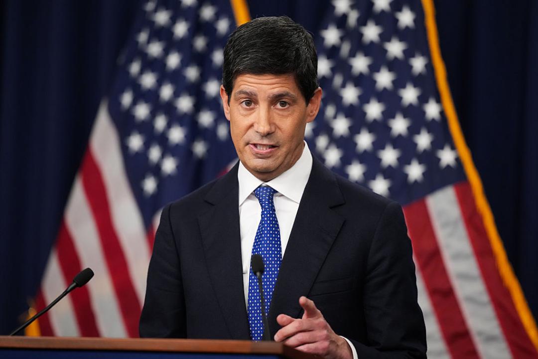 Federal Reserve Chair Kevin Warsh speaks at a podium in front of US flags, used as the ThriveInMarkets week-ahead inline image for October 5 to 9 2026, when Wednesday's FOMC minutes recap the September 15-16 hike to 3.75 to 4.00 percent after Friday's 29,000 payrolls print pulled October 28 hike odds into the high teens