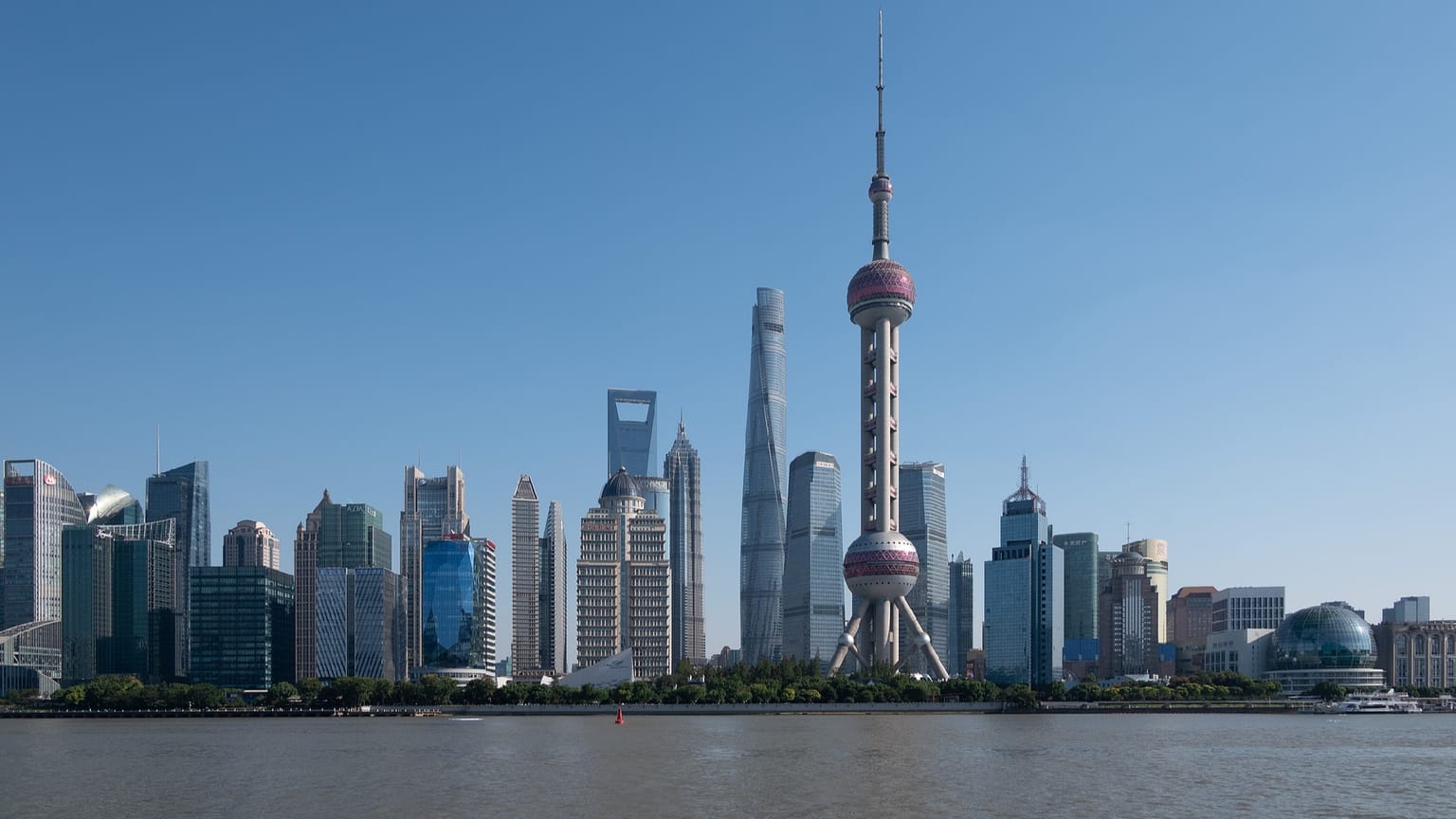 The Shanghai skyline along the Huangpu River including the Oriental Pearl Tower, used as the ThriveInMarkets week-ahead inline image for October 19 to 23 2026, when China Q3 GDP printed 4.5 percent year over year on Monday, beating the 4.4 percent consensus