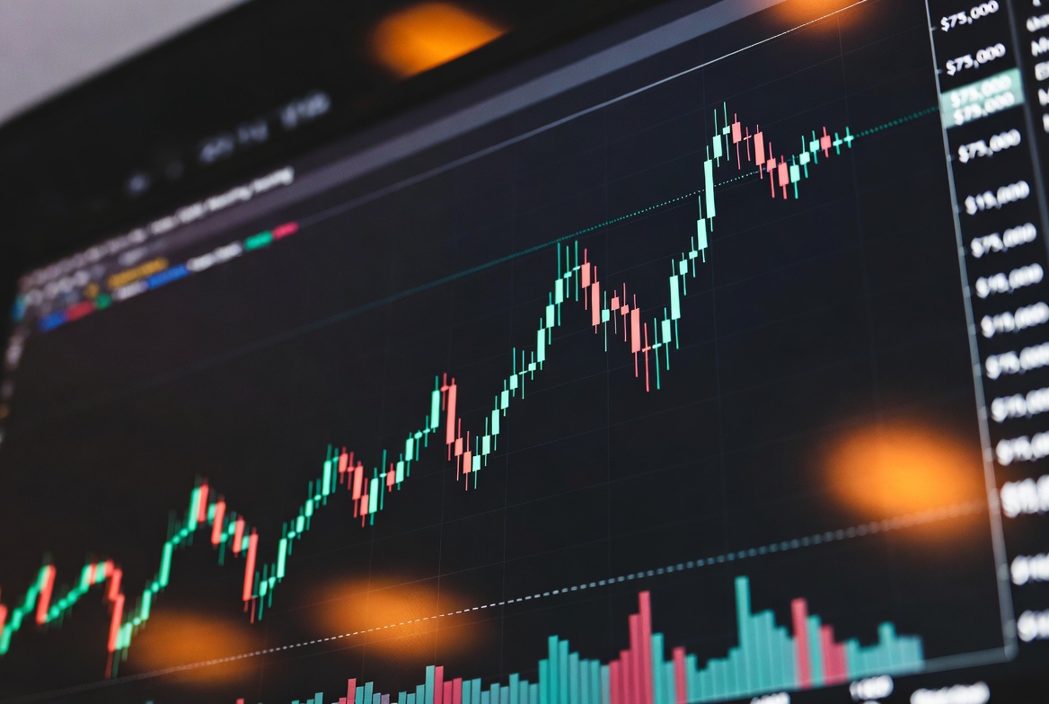 Bitcoin price chart at 75000 USD candlestick green and red bars April 19 2026 BTC defending key level into FOMC