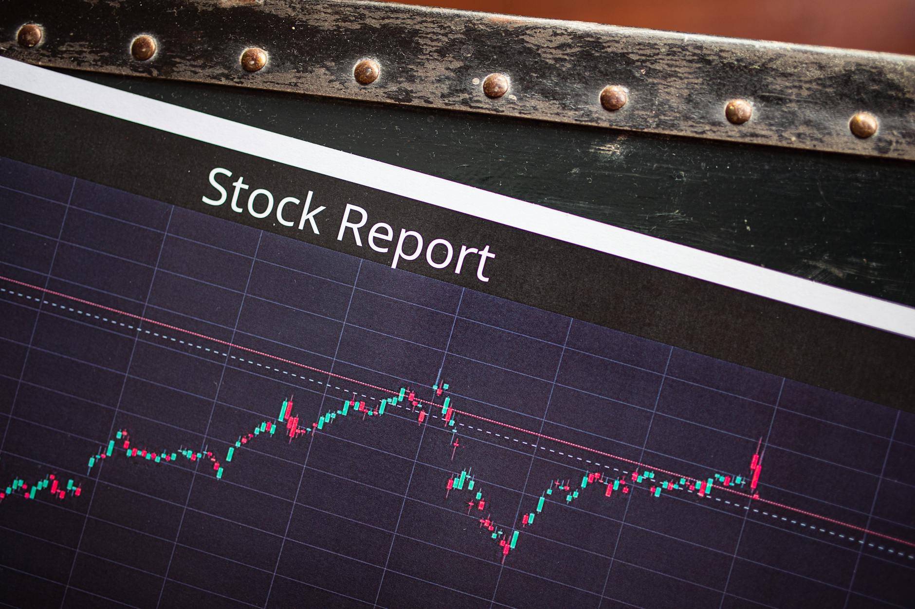 Wall Street trading floor screens showing record S&P 500 close 7165 and Nvidia 5 trillion market cap heading into April 28-29 FOMC week 2026