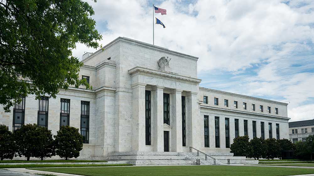 The Marriner S. Eccles Federal Reserve Board Building in Washington, used as the ThriveInMarkets weekend recap hero for the week of August 24 to 30 2026, when Chair Kevin Warsh's first Jackson Hole keynote lifted September hike odds toward 58 percent, the S&P 500 closed Friday at 7,711.76 up 0.49 percent on the week, and spot gold settled about 4,455 dollars